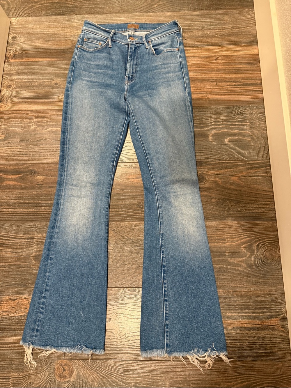 MOTHER Light Blue Flare Jeans with Raw Frayed Hem